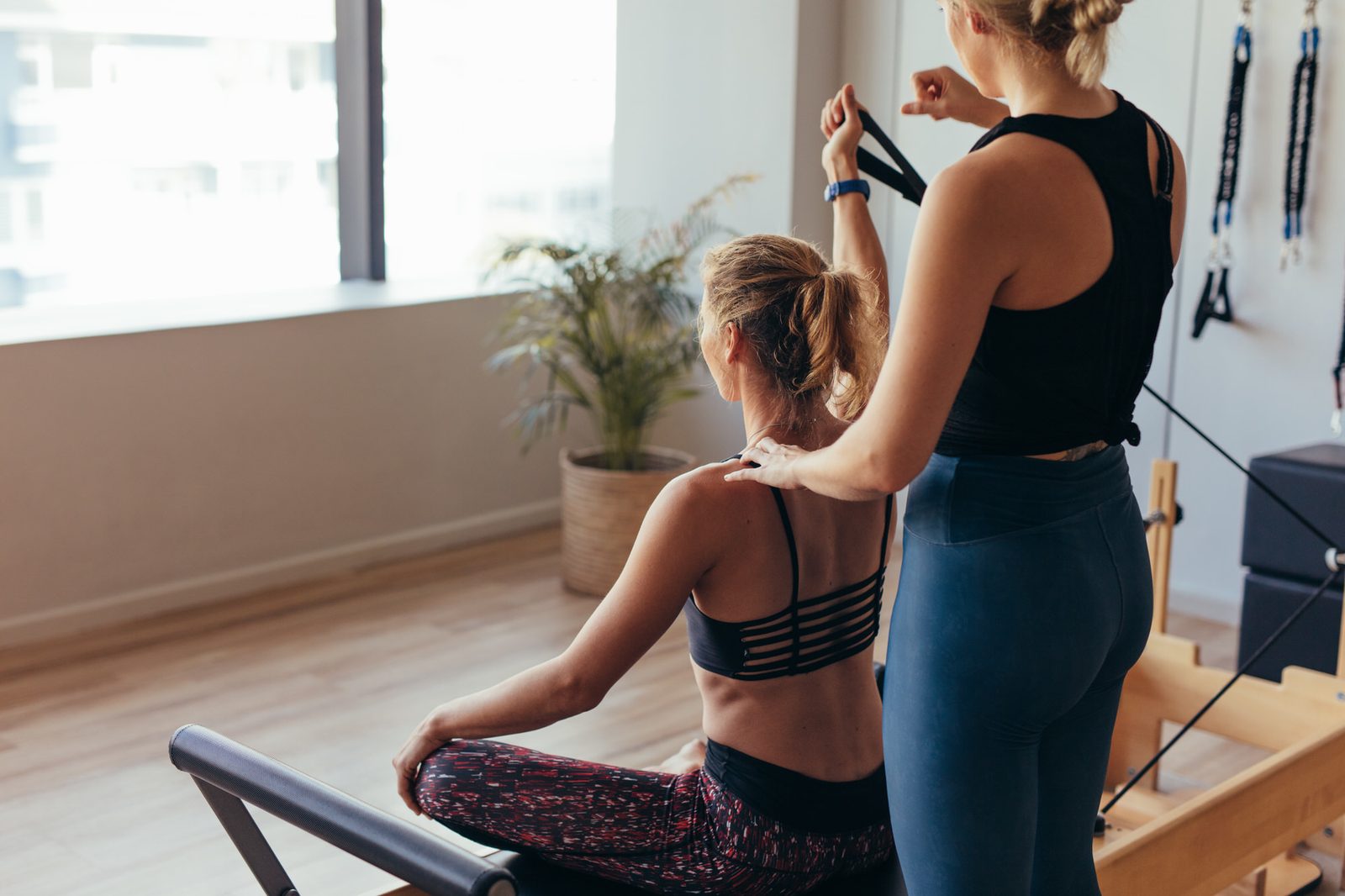 One-on-one studio Pilates session with an instructor